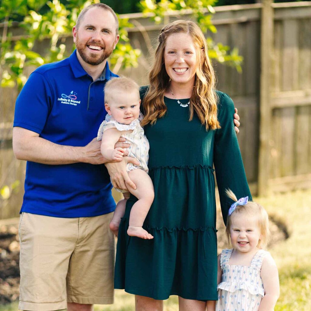 Stephanie Vogler with husband and two young daughters